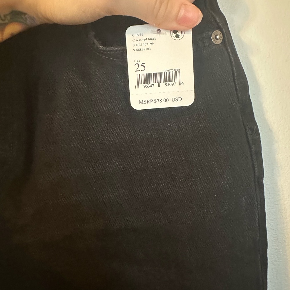 Free people size 25 black ripped jeans.
